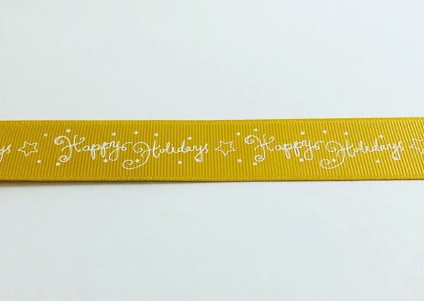 Happy Holidays Gold 25mm Grosgrain Ribbon sold by the metre